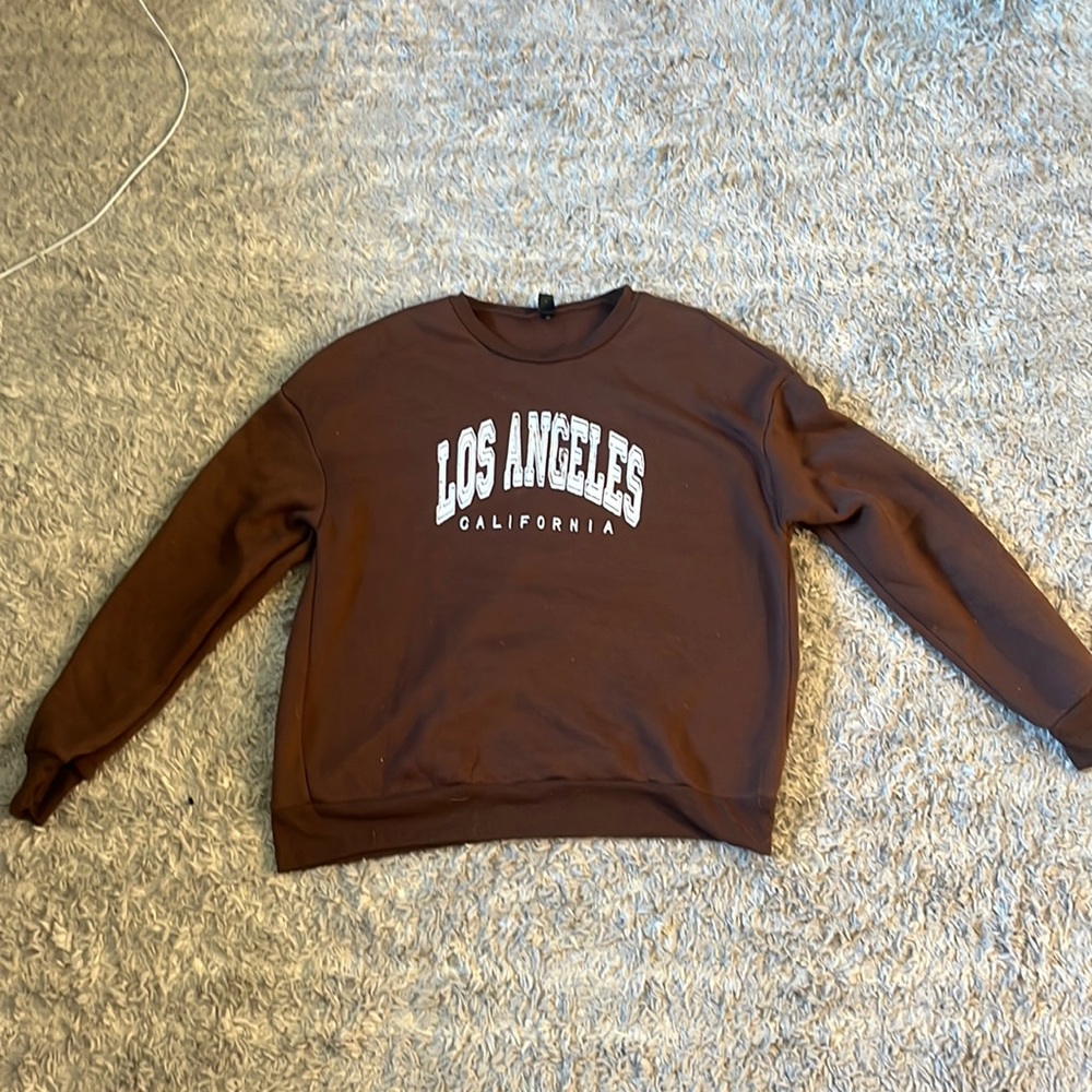 Brown crewneck. size medium.